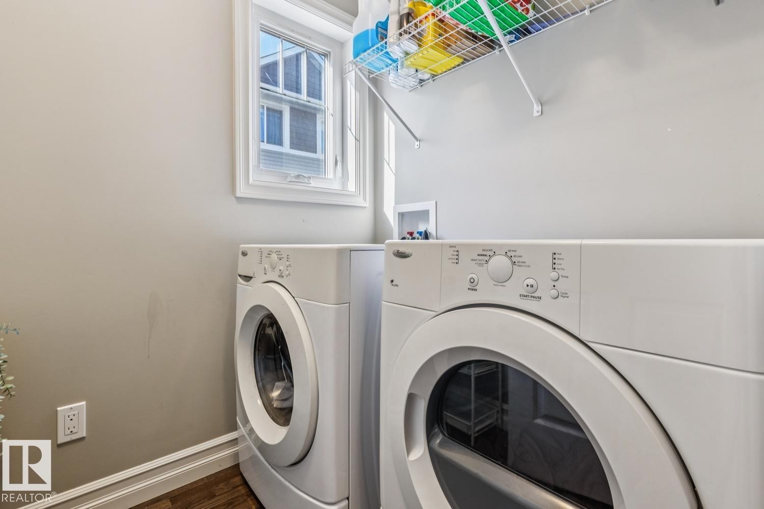 Laundry room featuring dark wood-type flooring and washer and dryer - 5409 3 Avenue, Edmonton, AB - Indoor Photo Showing Laundry Room
