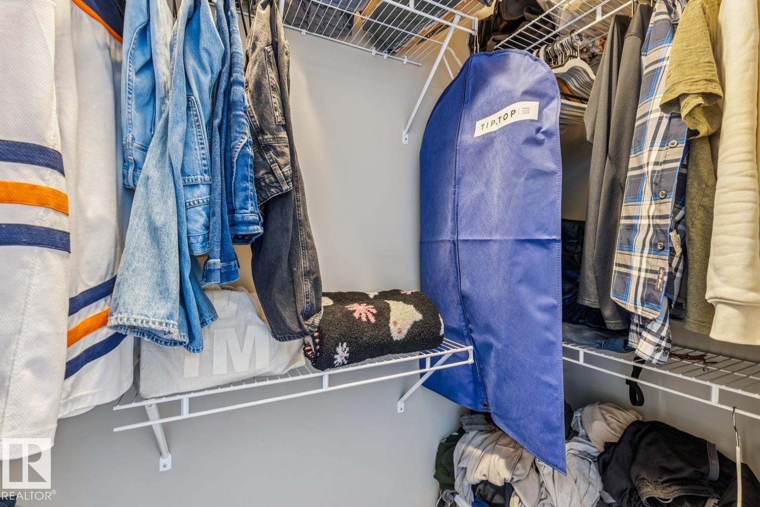 View of walk in closet - 5409 3 Avenue, Edmonton, AB - Indoor With Storage