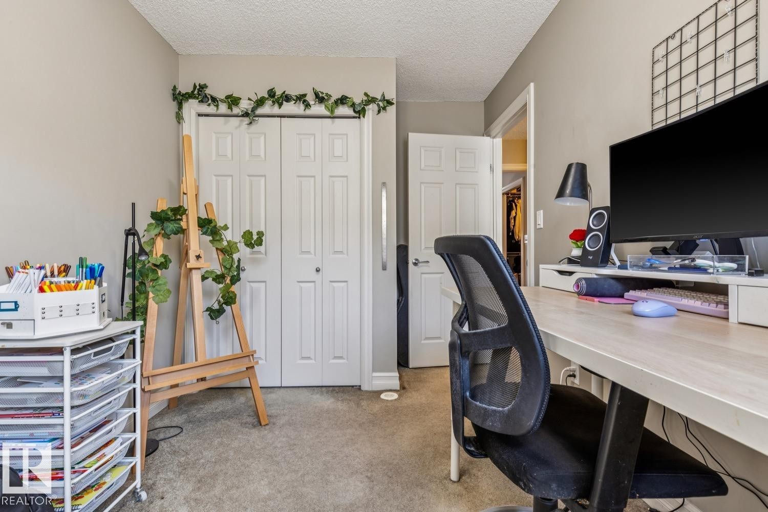 Home office with light carpet and a textured ceiling - 5409 3 Avenue, Edmonton, AB - Indoor Photo Showing Office