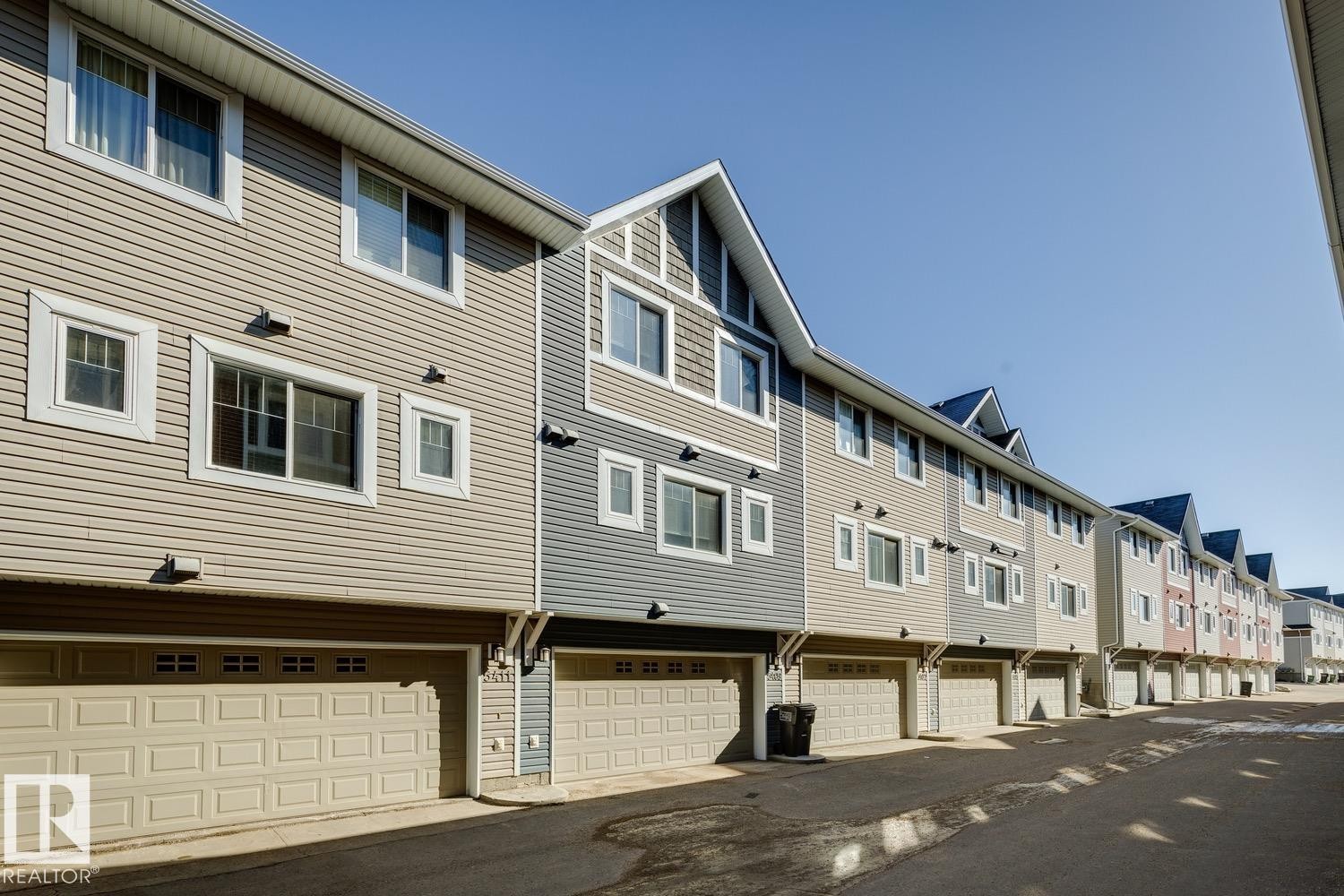 Rear view of property featuring a residential view - 5409 3 Avenue, Edmonton, AB - Outdoor