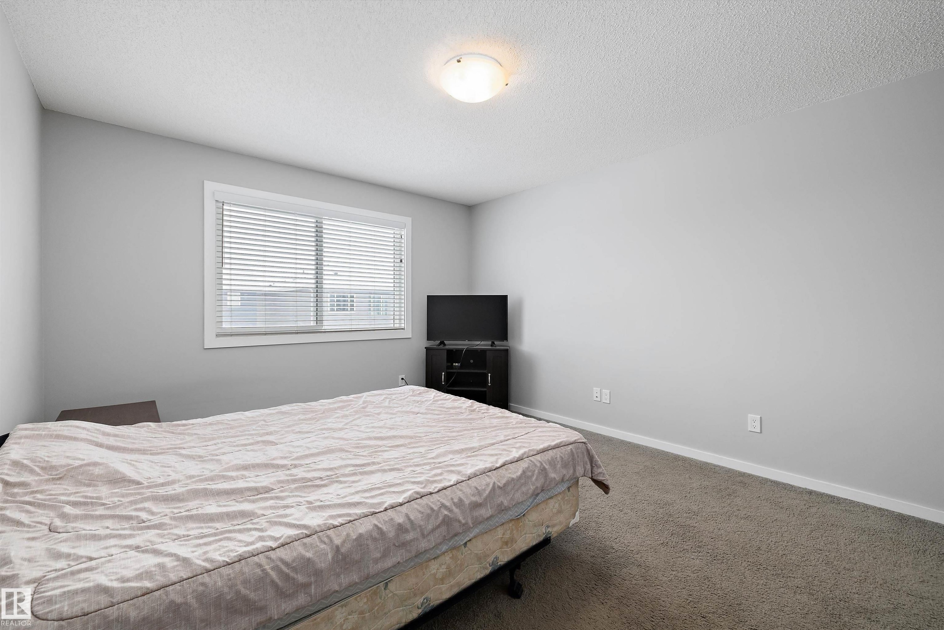 7 Stout Place, Leduc, AB - Indoor Photo Showing Bedroom