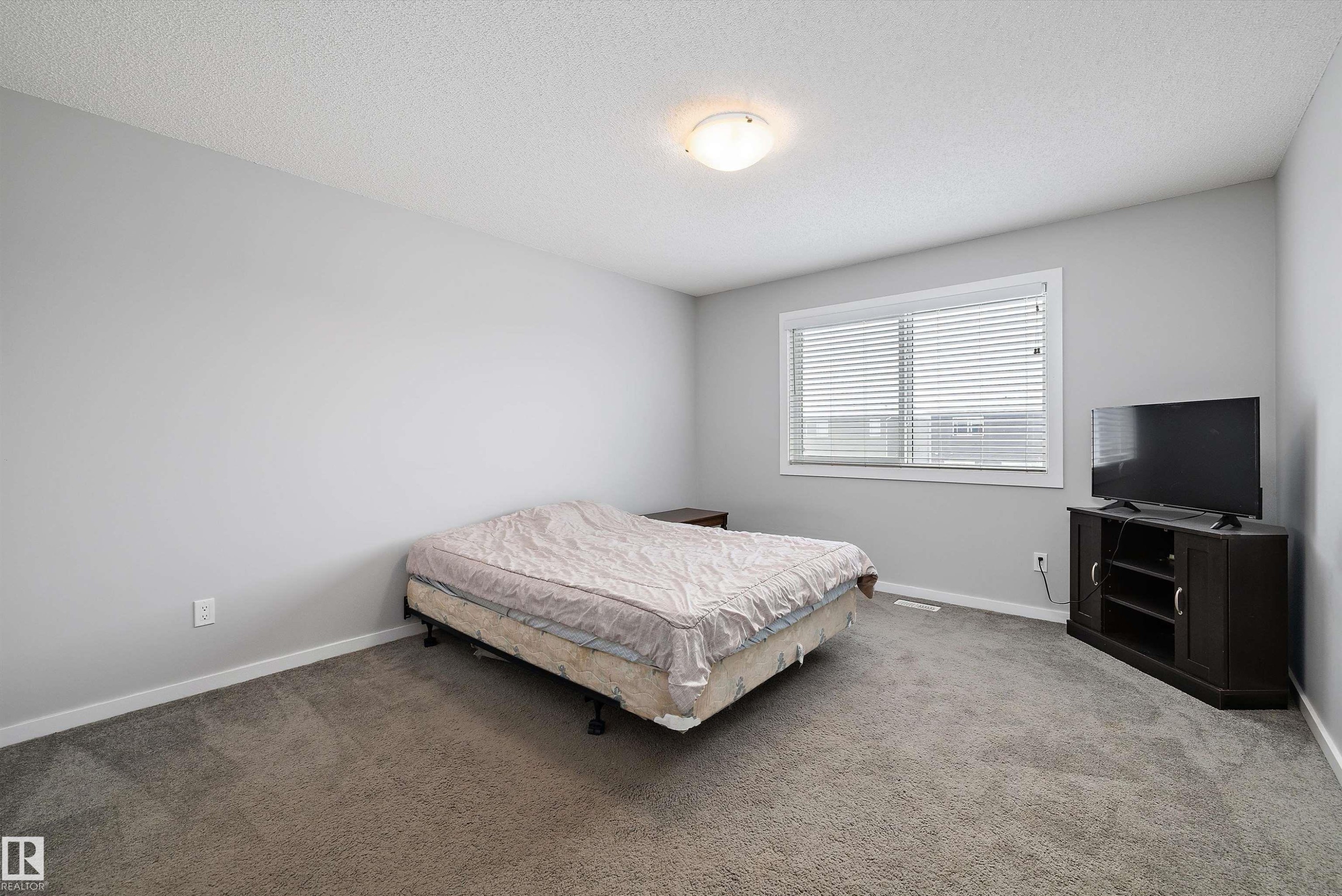 7 Stout Place, Leduc, AB - Indoor Photo Showing Bedroom