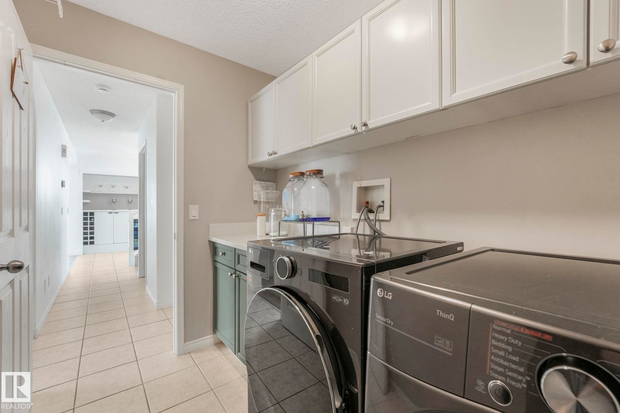 12 Rue Bouchard, Beaumont, AB - Indoor Photo Showing Laundry Room
