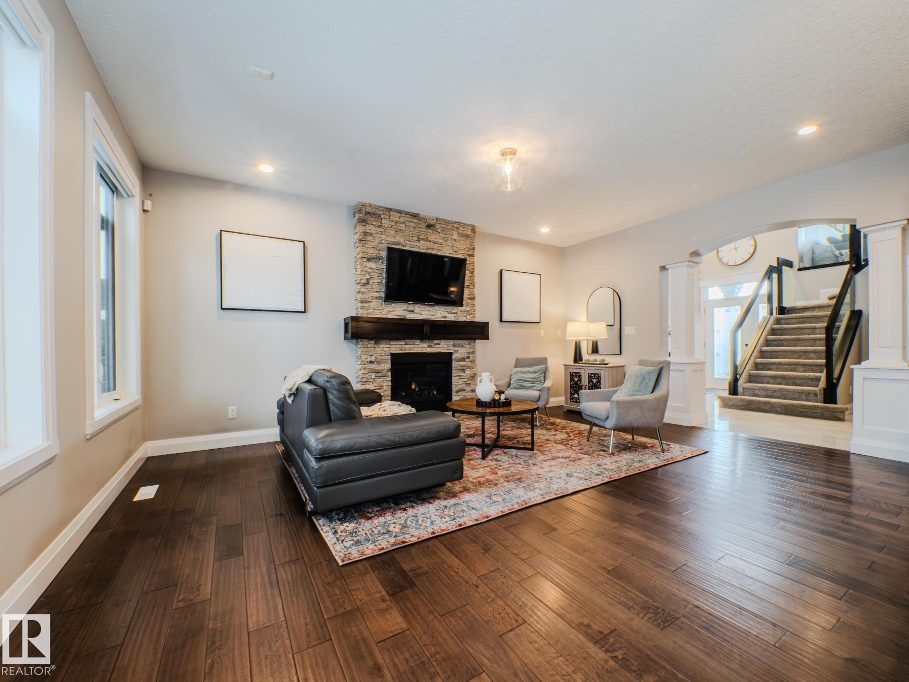 2611 Blue Jay Close, Edmonton, AB - Indoor Photo Showing Living Room With Fireplace