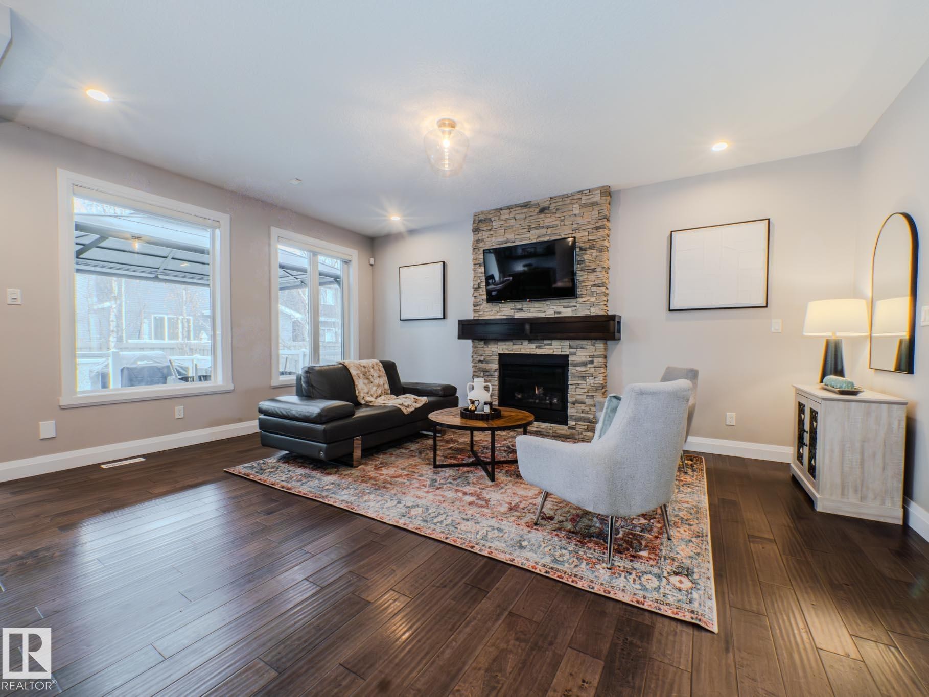 2611 Blue Jay Close, Edmonton, AB - Indoor Photo Showing Living Room With Fireplace