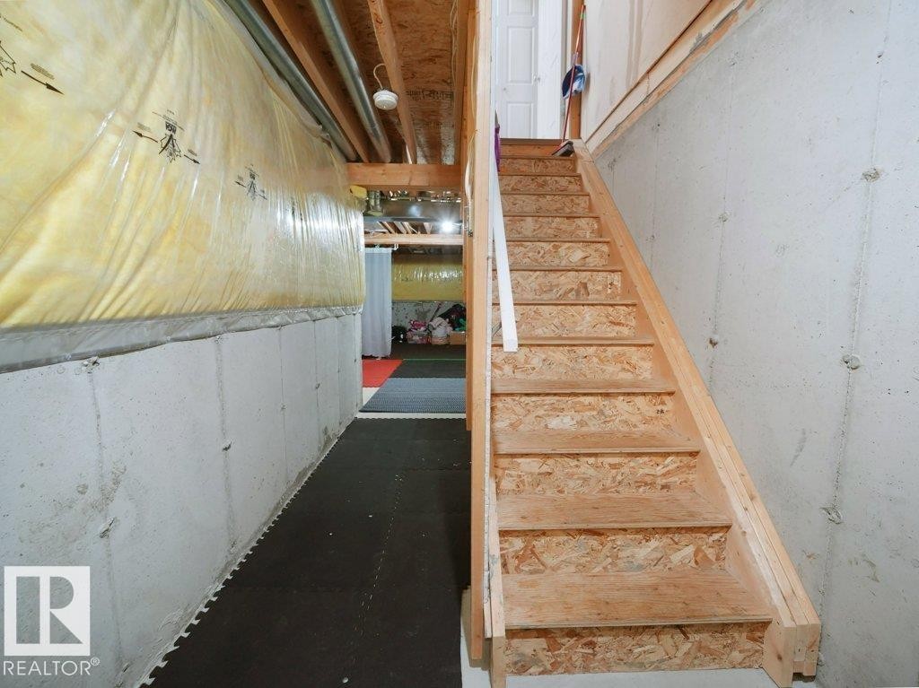 View of staircase - 196 230 Edwards Drive, Edmonton, AB - Indoor Photo Showing Other Room