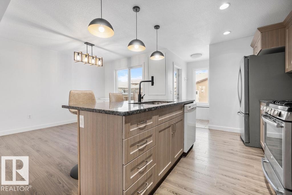 221 Cy Becker Blvd, Edmonton, AB - Indoor Photo Showing Kitchen With Upgraded Kitchen