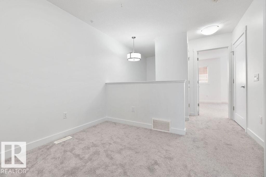 221 Cy Becker Blvd, Edmonton, AB - Indoor Photo Showing Other Room