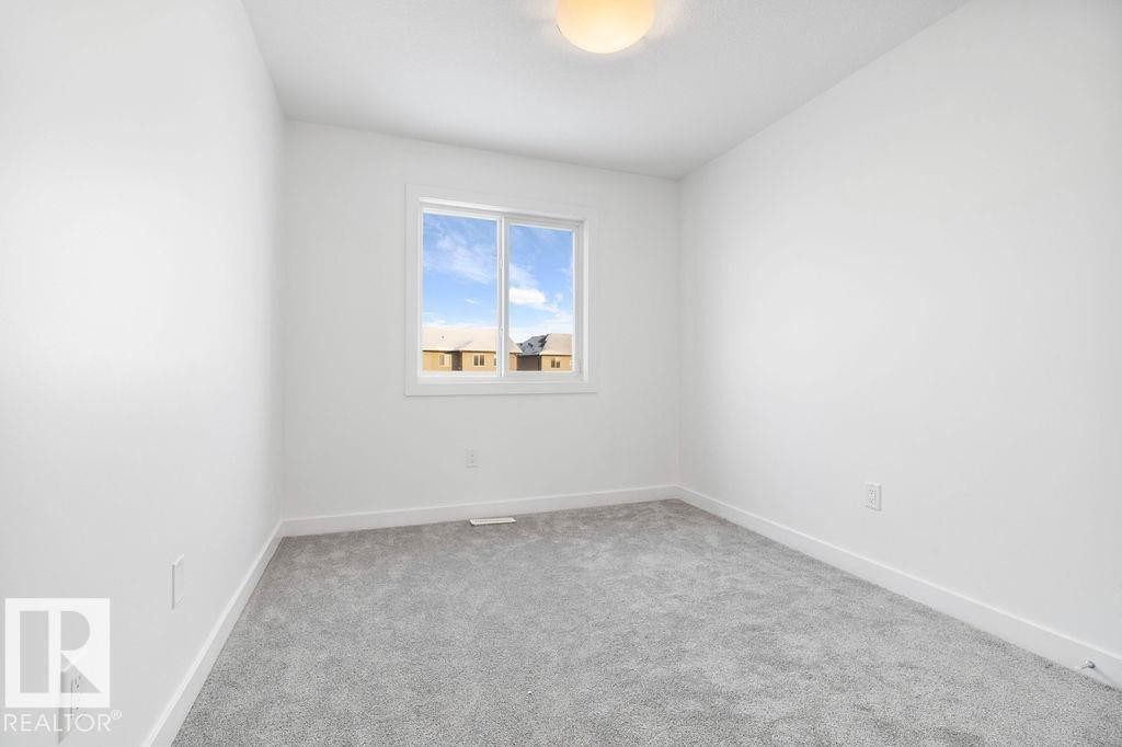 221 Cy Becker Blvd, Edmonton, AB - Indoor Photo Showing Other Room