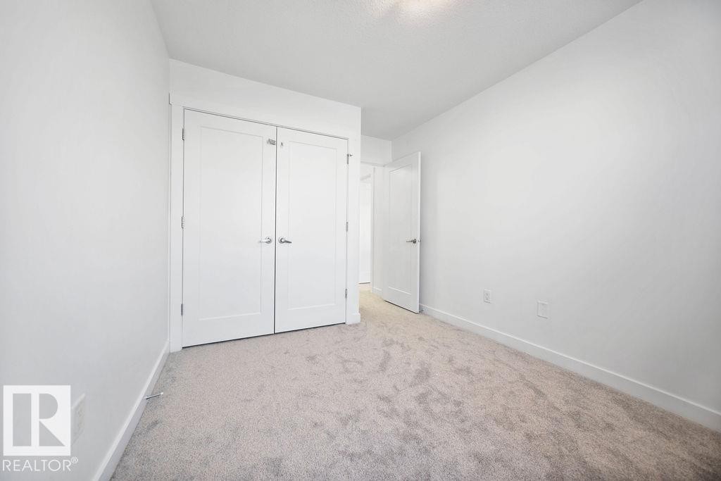 221 Cy Becker Blvd, Edmonton, AB - Indoor Photo Showing Other Room