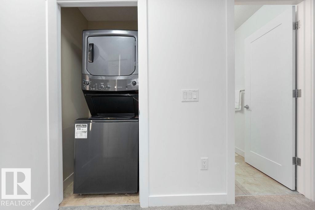 221 Cy Becker Blvd, Edmonton, AB - Indoor Photo Showing Laundry Room