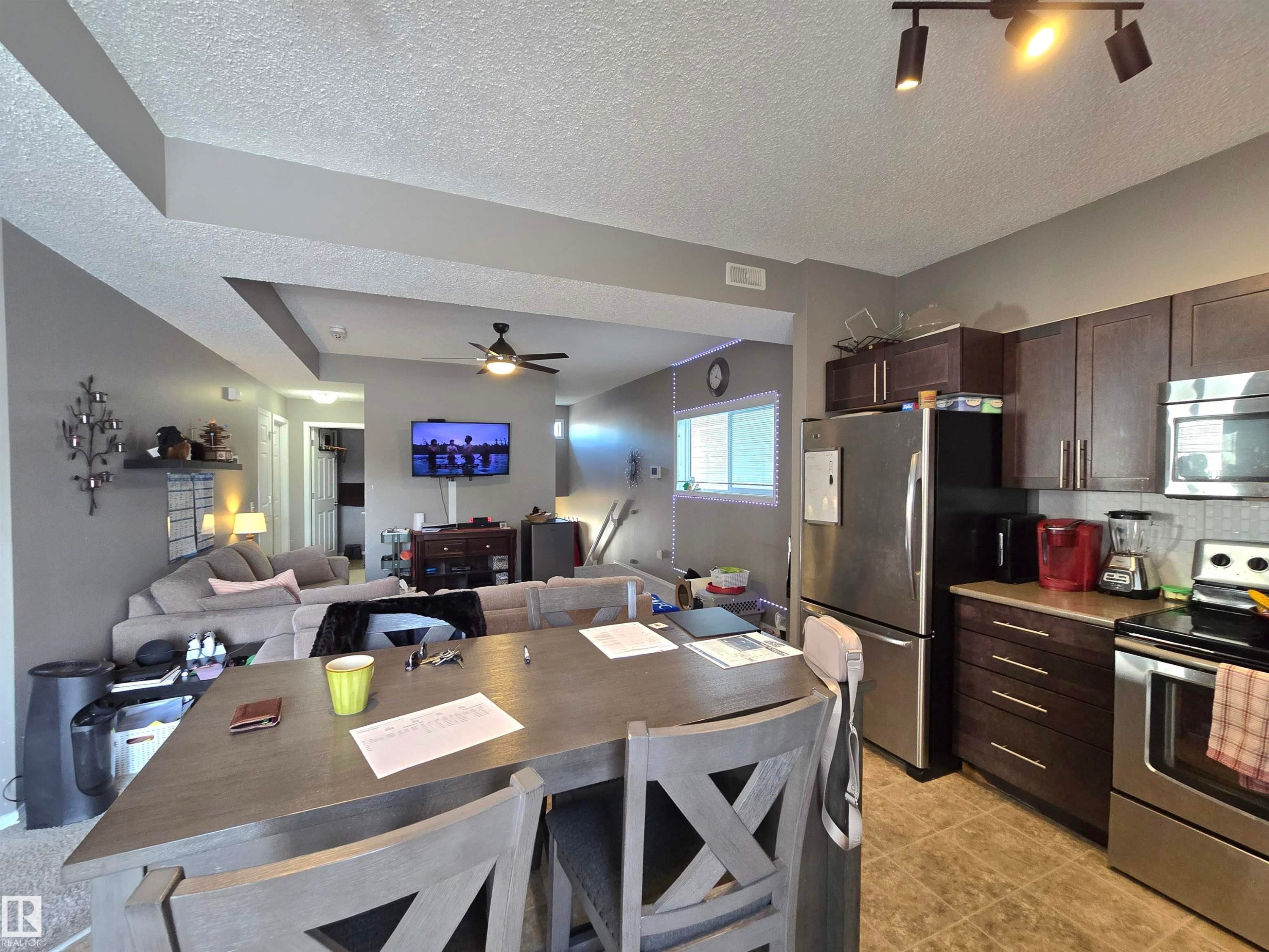 24 6520 2 Avenue Sw, Edmonton, AB - Indoor Photo Showing Kitchen With Stainless Steel Kitchen