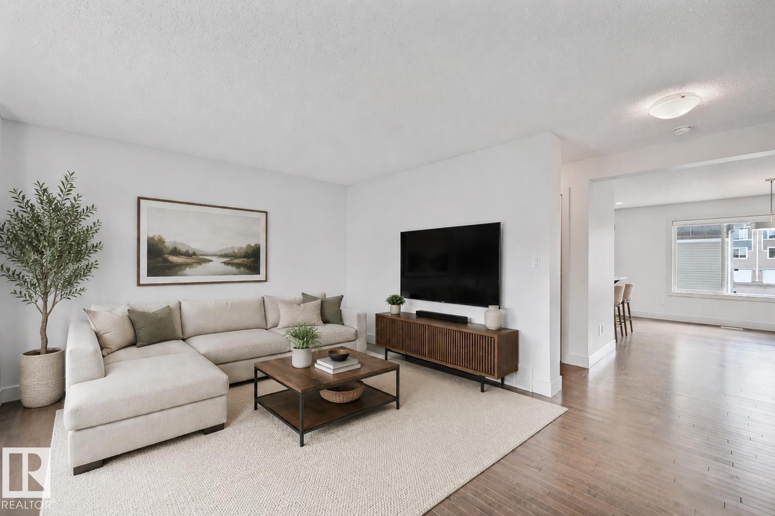Virtually staged - 35 2922 Maple Way, Edmonton, AB - Indoor Photo Showing Living Room