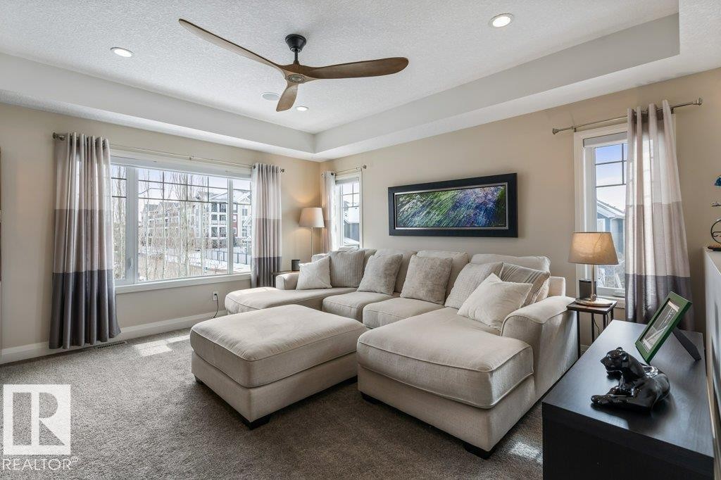 Upstairs Bonus Room featuring South East Facing Windows, and large space to unwind with family - 4476 Suzanna Crescent, Edmonton, AB - Indoor Photo Showing Living Room
