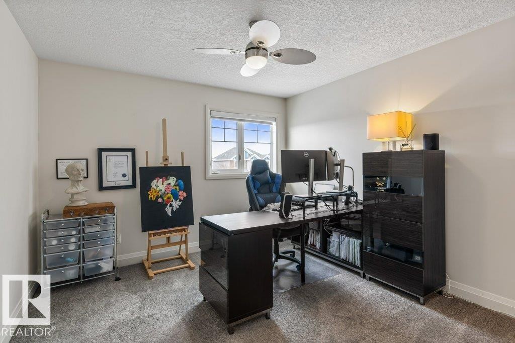 Bedroom featuring West Facing Window, and Walk In Closet - 4476 Suzanna Crescent, Edmonton, AB - Indoor Photo Showing Office
