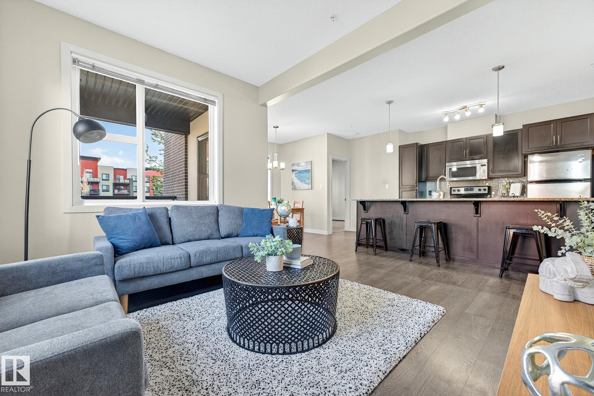 247 308 Ambleside Link, Edmonton, AB - Indoor Photo Showing Living Room