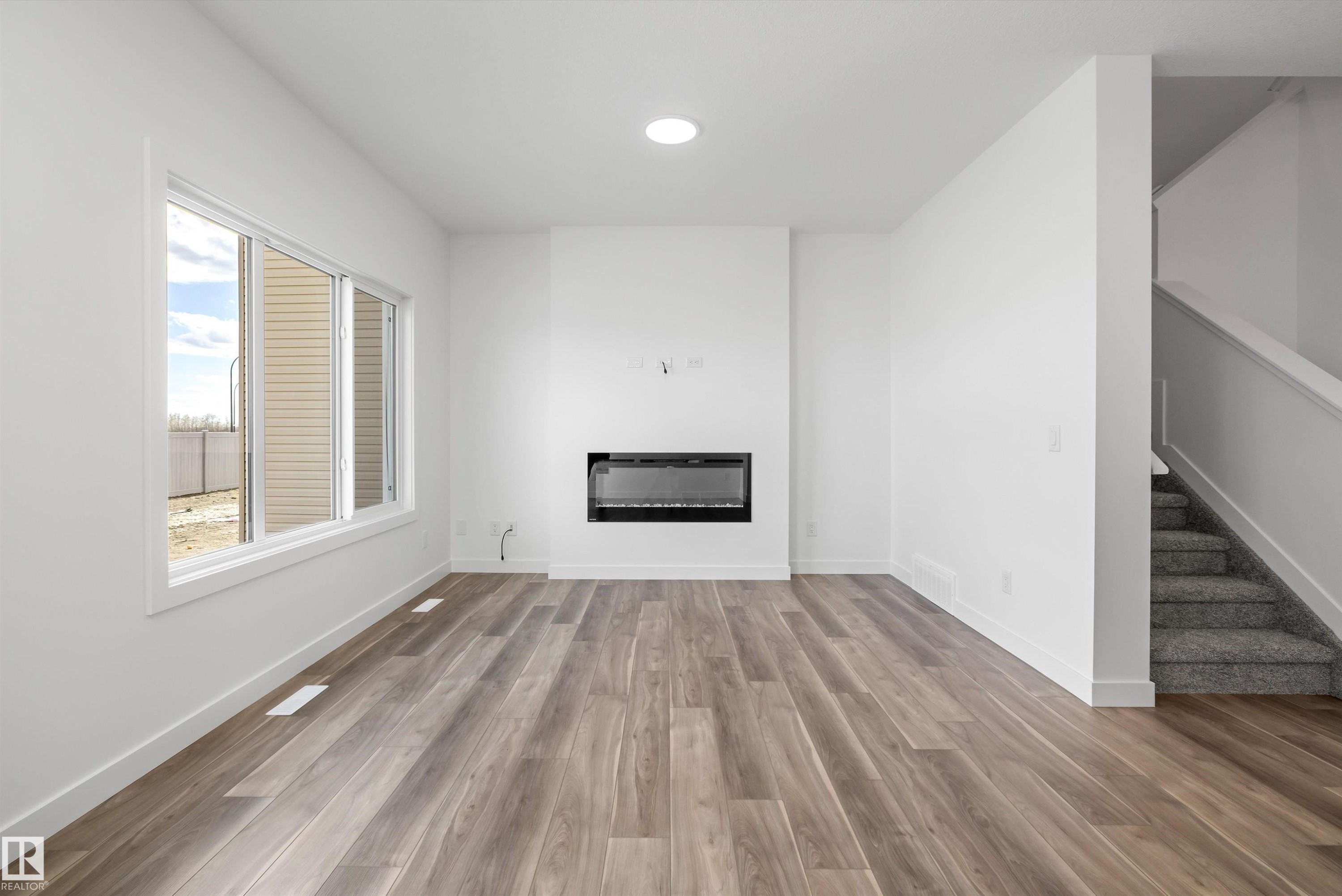 19111 20 Avenue, Edmonton, AB - Indoor With Fireplace