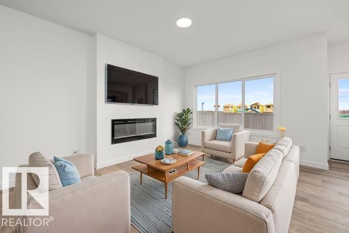 19115 20 Avenue Nw, Edmonton, AB - Indoor Photo Showing Living Room With Fireplace