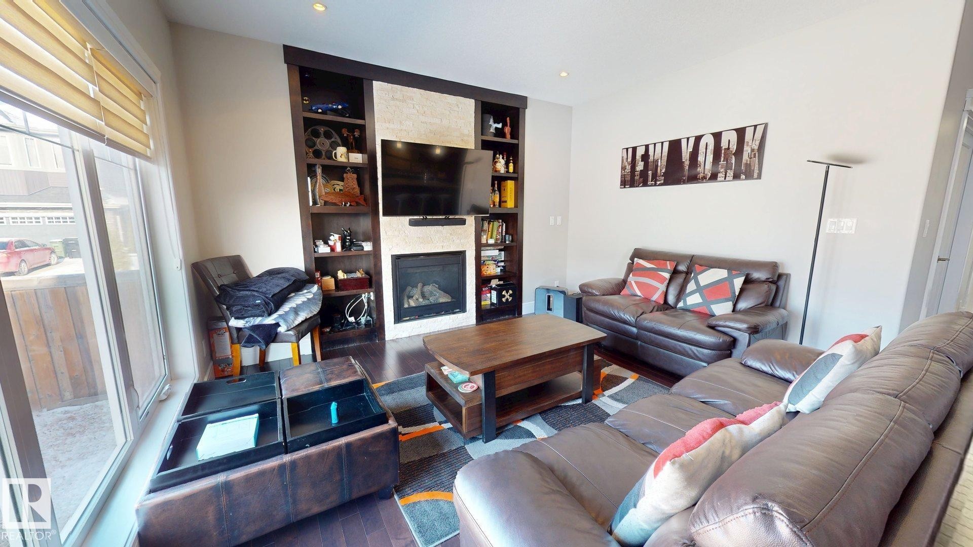 3621 Claxton Place, Edmonton, AB - Indoor Photo Showing Living Room With Fireplace
