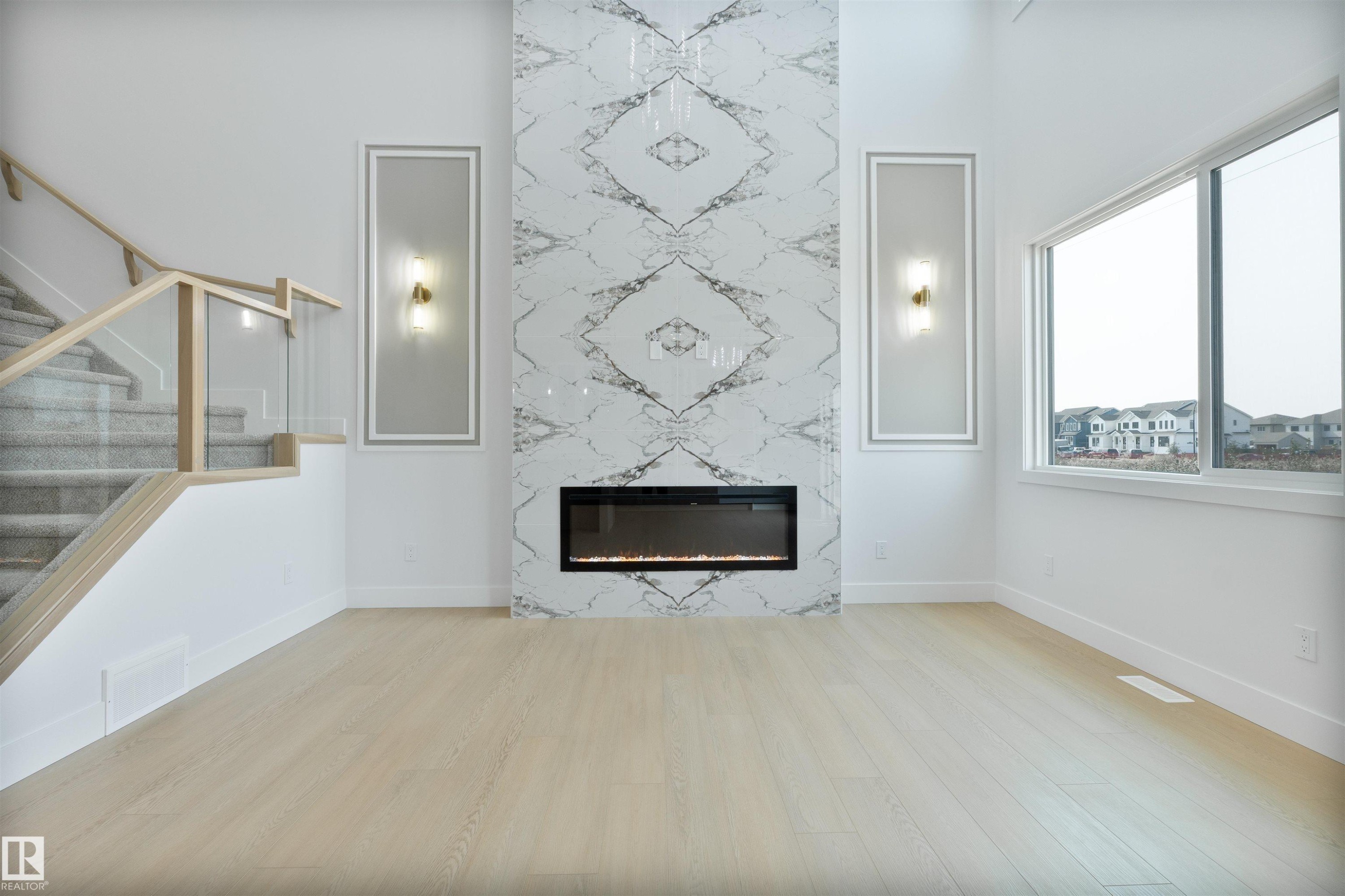 603 Ashgrove Circle, Leduc, AB - Indoor Photo Showing Living Room With Fireplace