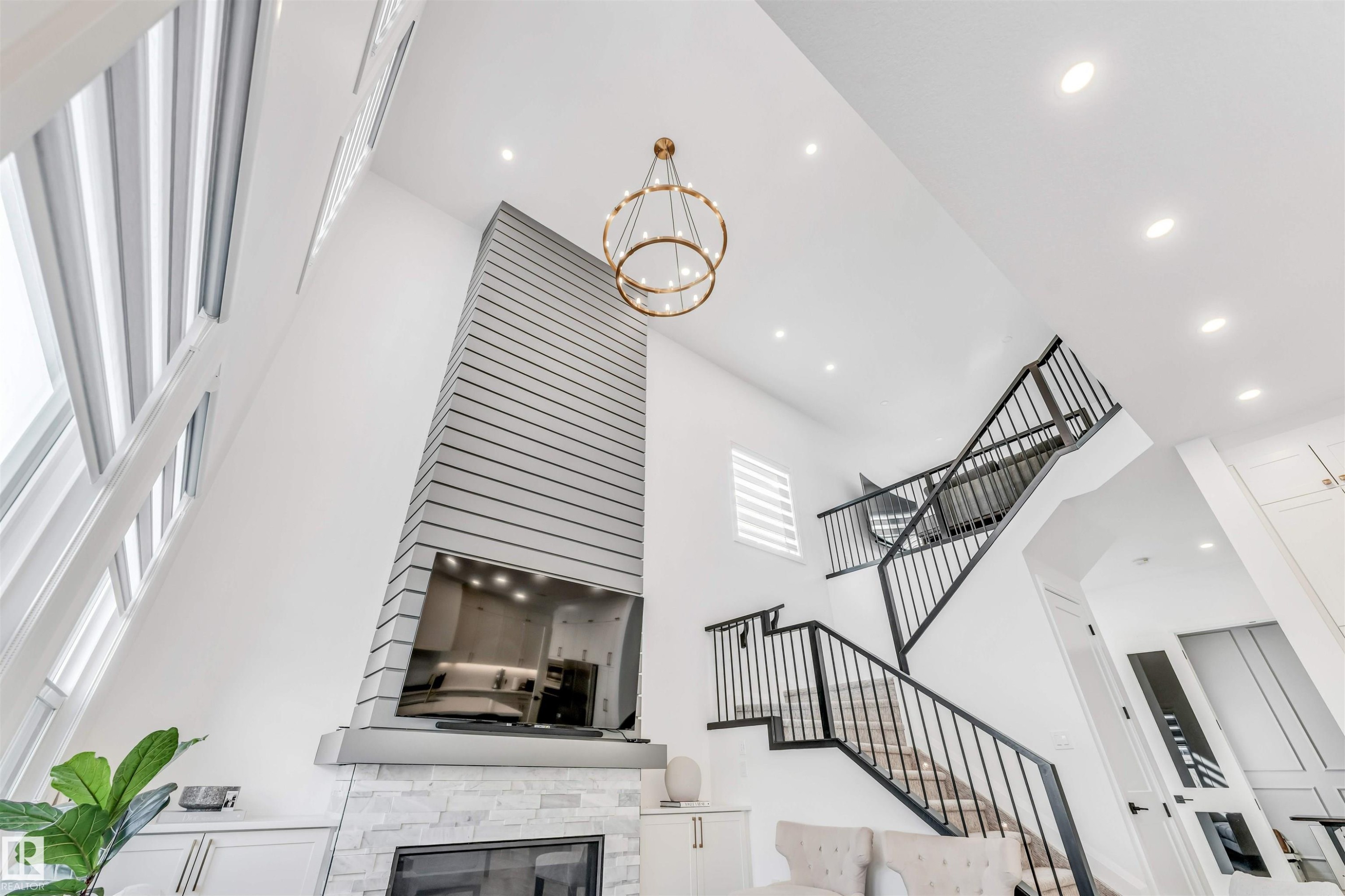 6464 Elston Loop, Edmonton, AB - Indoor Photo Showing Other Room With Fireplace