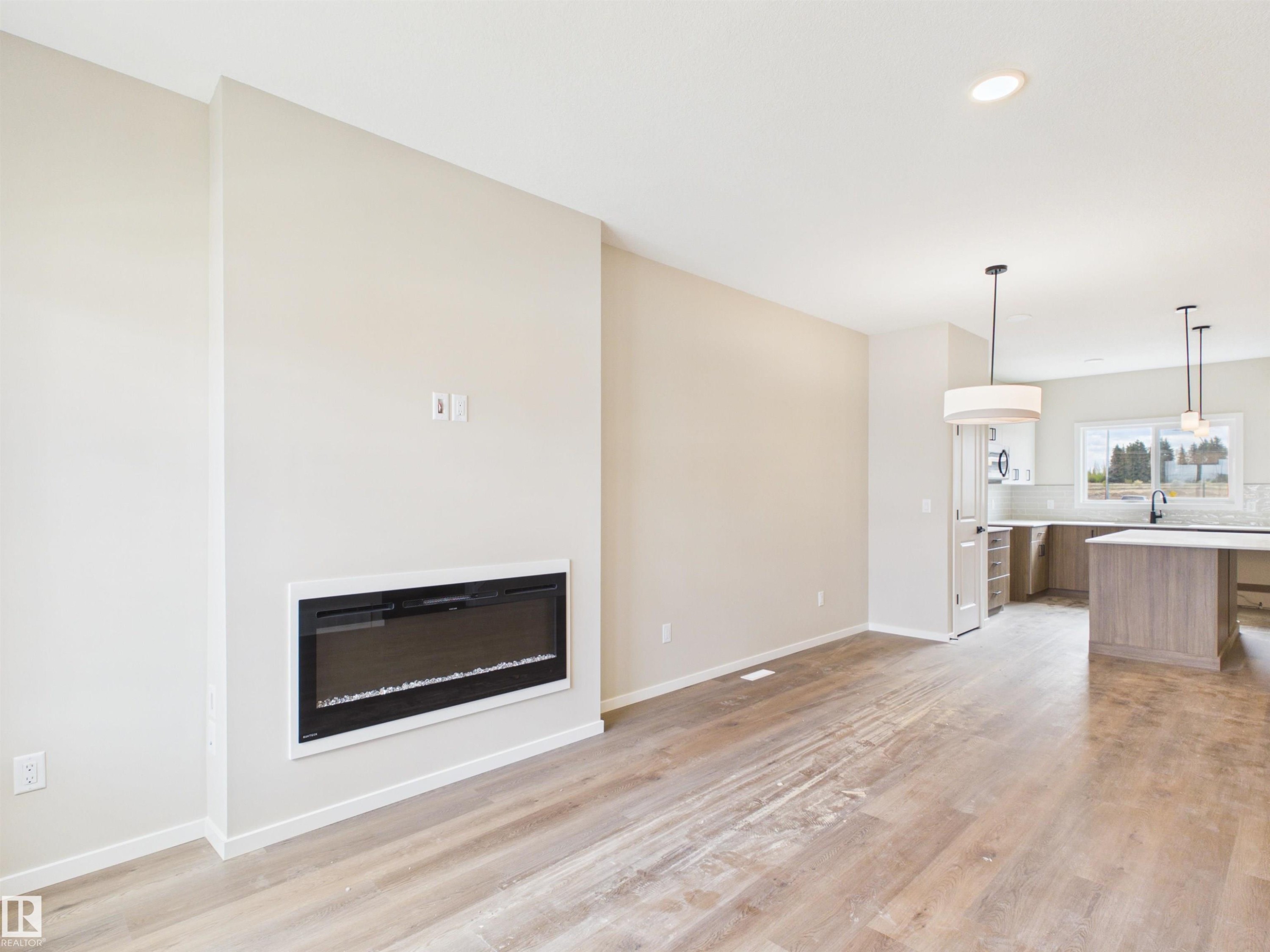 1100 Mcleod Avenue, Spruce Grove, AB - Indoor With Fireplace