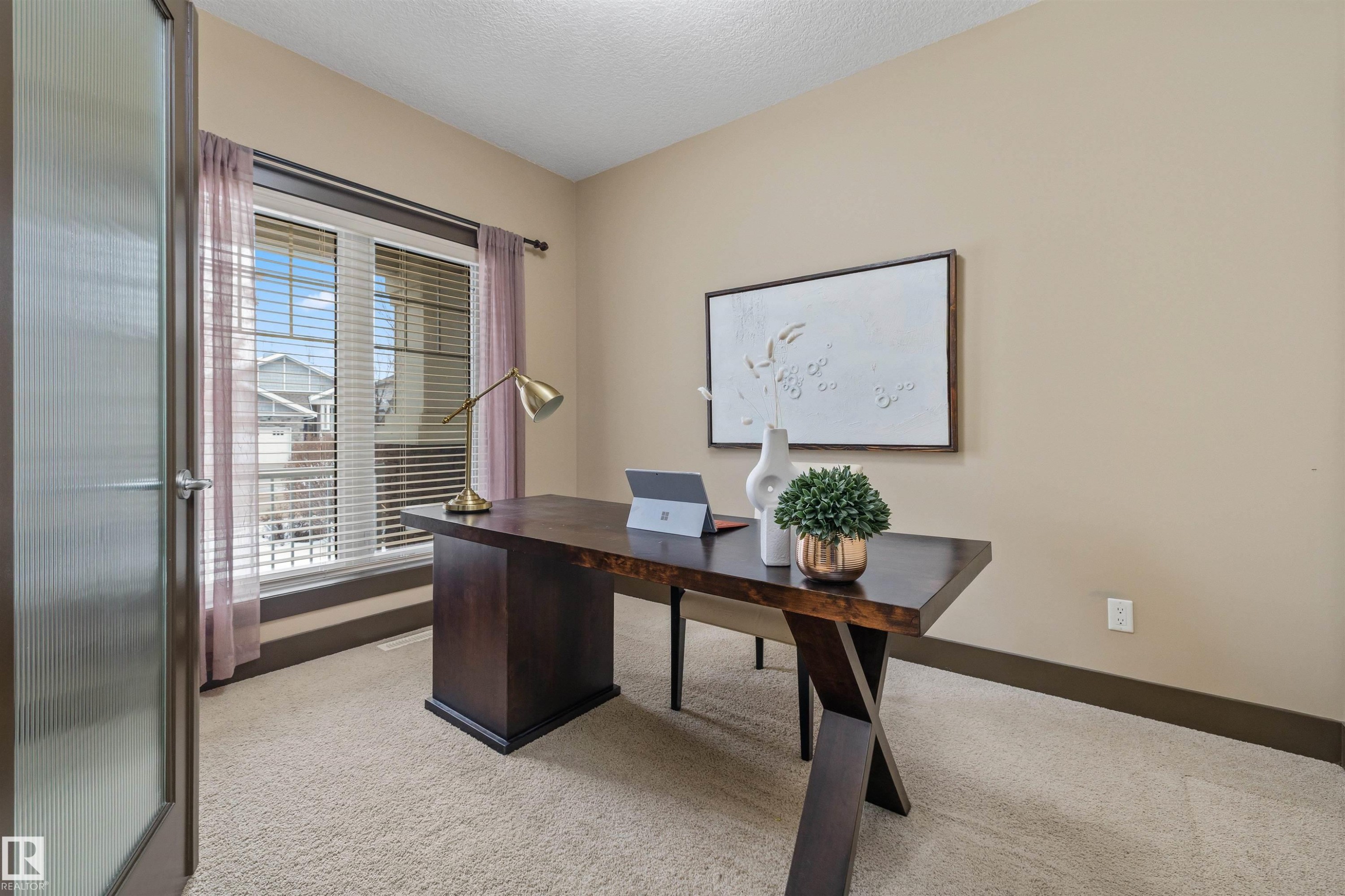 This bright room features a large window with blinds and sheer curtains, providing natural light - 1014 Hope Road, Edmonton, AB - Indoor Photo Showing Office