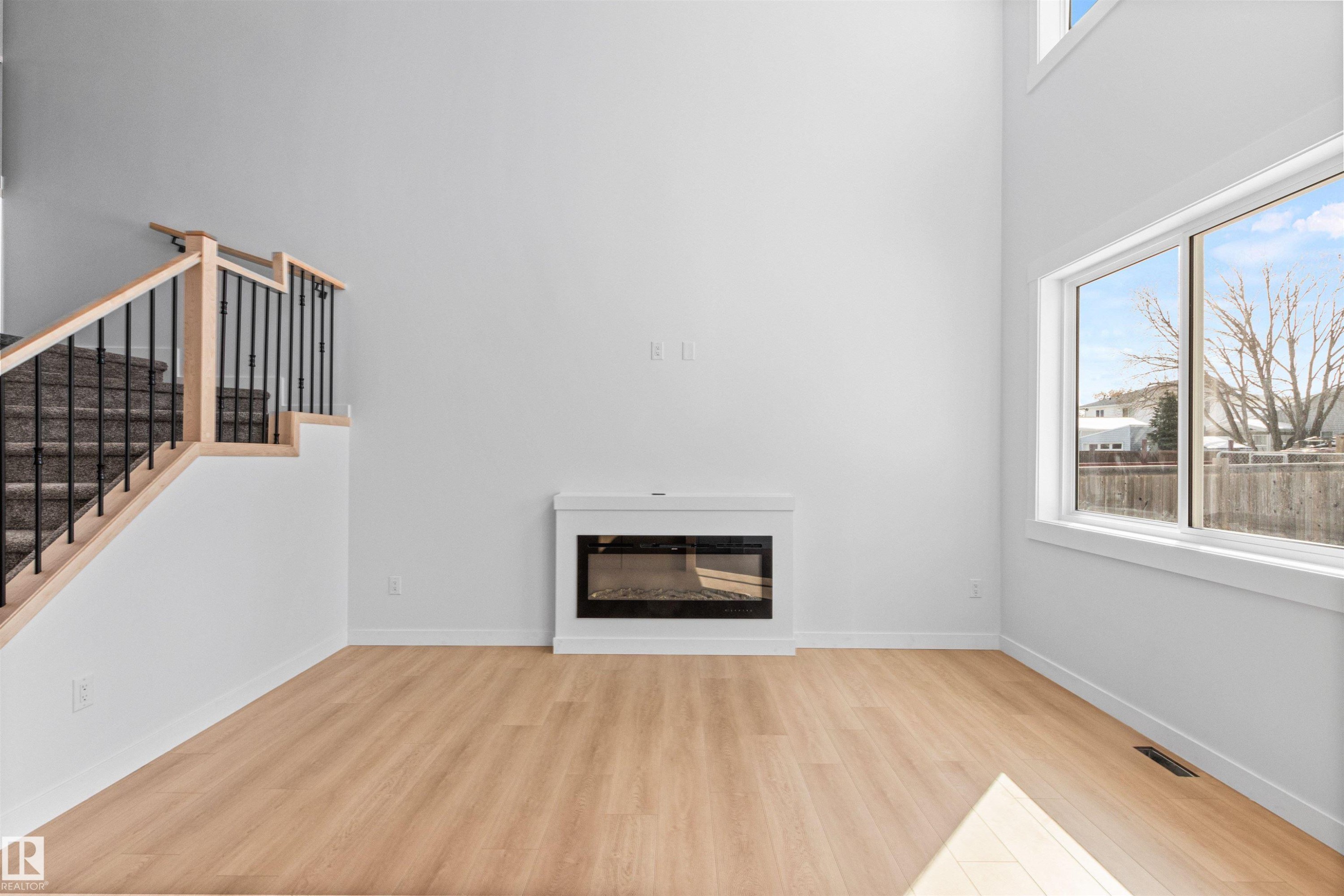 5133 53 Avenue, Calmar, AB - Indoor Photo Showing Other Room With Fireplace