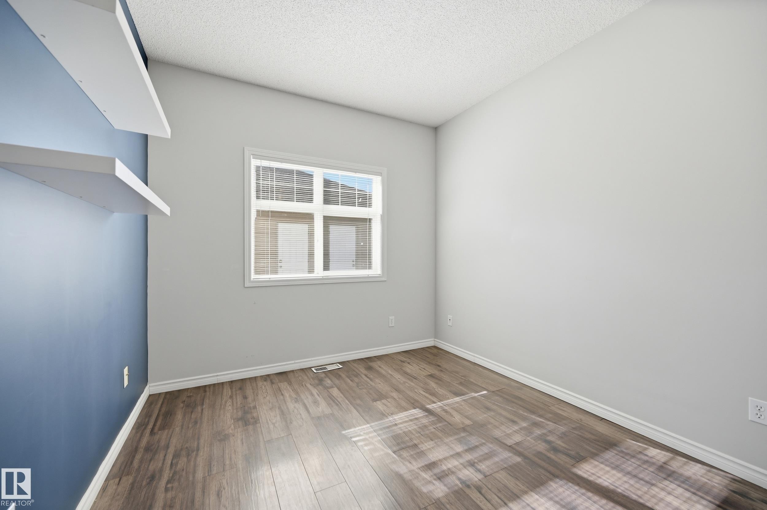 111 3040 Spence Wynd, Edmonton, AB - Indoor Photo Showing Other Room