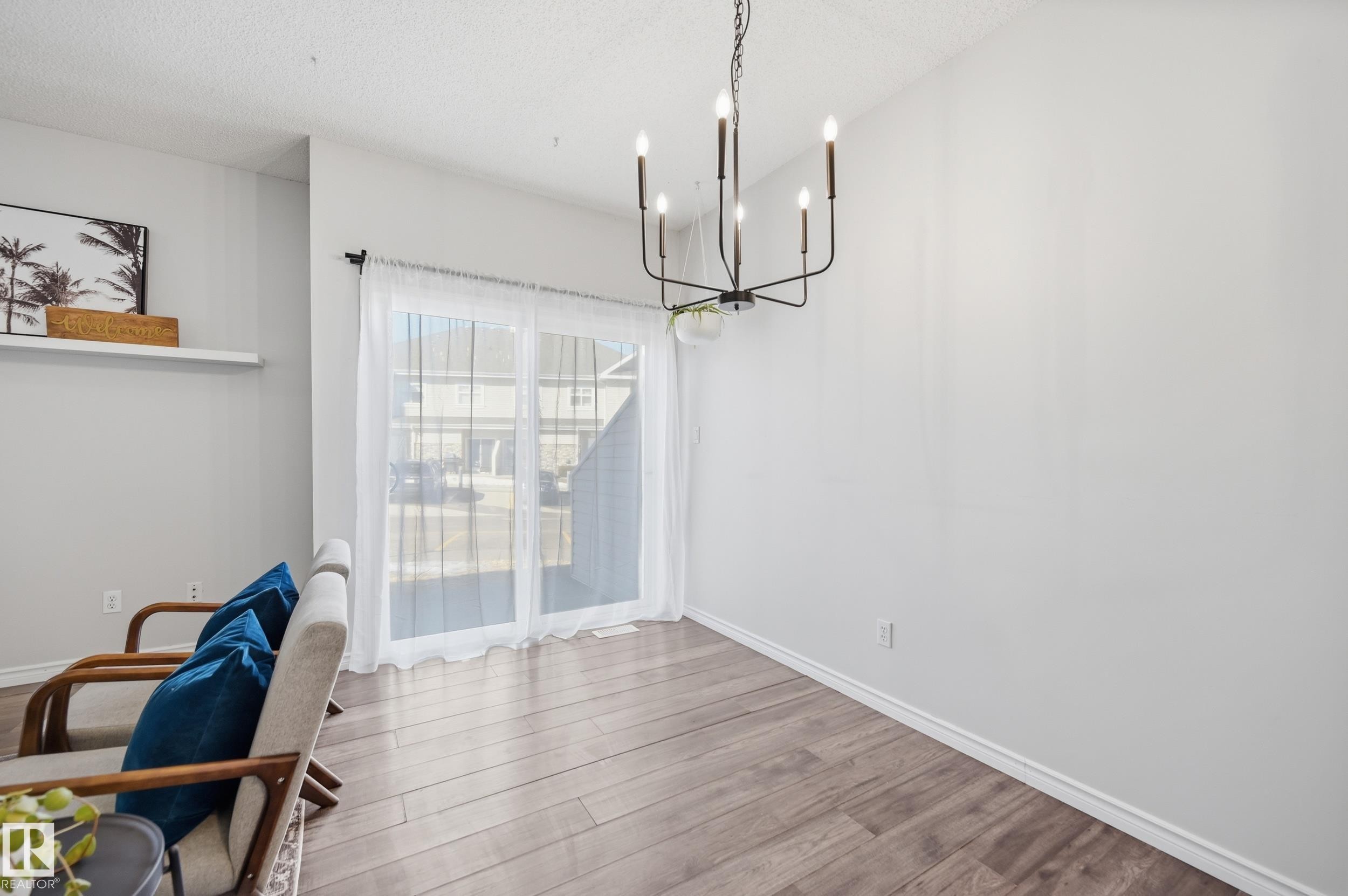 111 3040 Spence Wynd, Edmonton, AB - Indoor Photo Showing Other Room