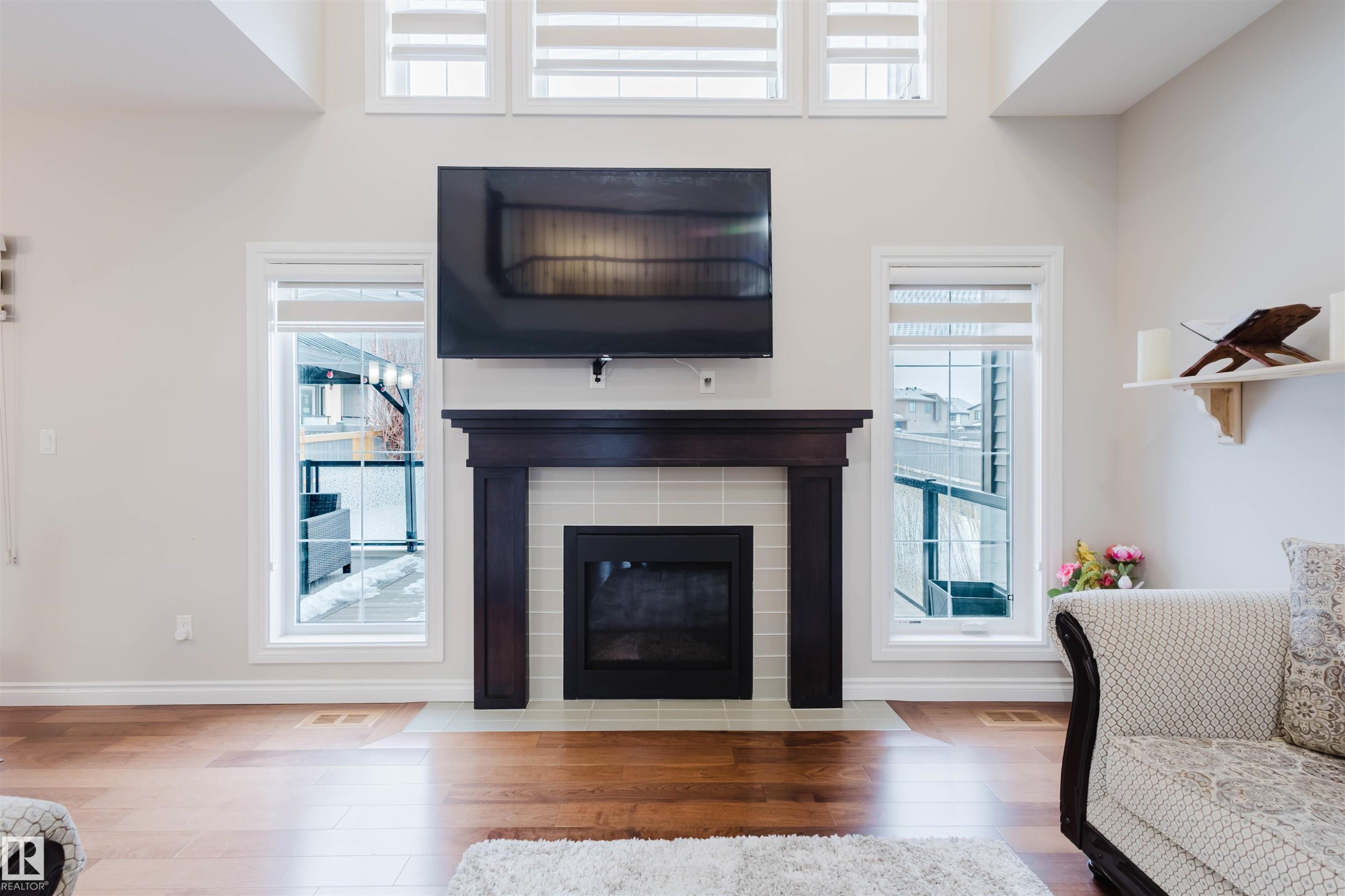 3920 Ginsburg Crescent, Edmonton, AB - Indoor Photo Showing Living Room With Fireplace