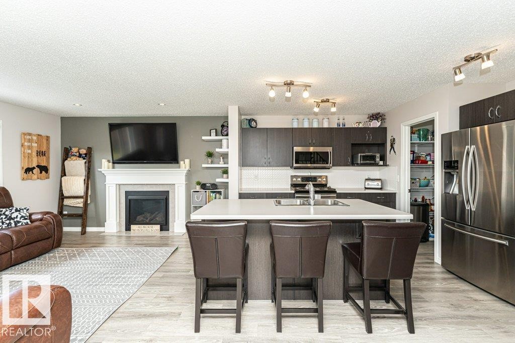 8727 Carson Way, Edmonton, AB - Indoor With Fireplace
