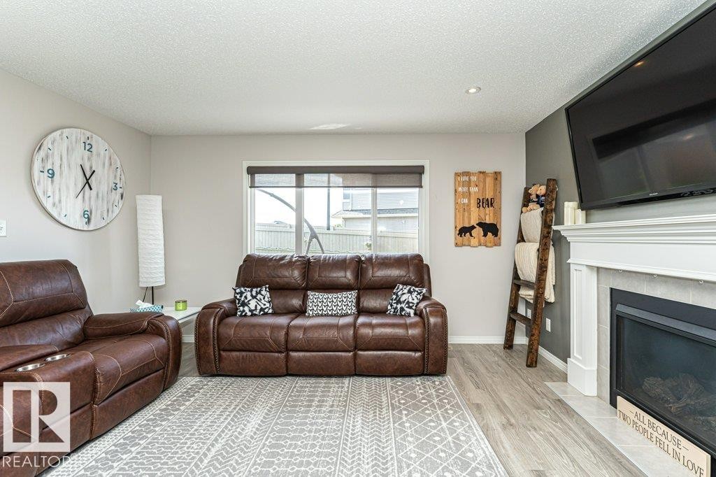 8727 Carson Way, Edmonton, AB - Indoor Photo Showing Living Room With Fireplace