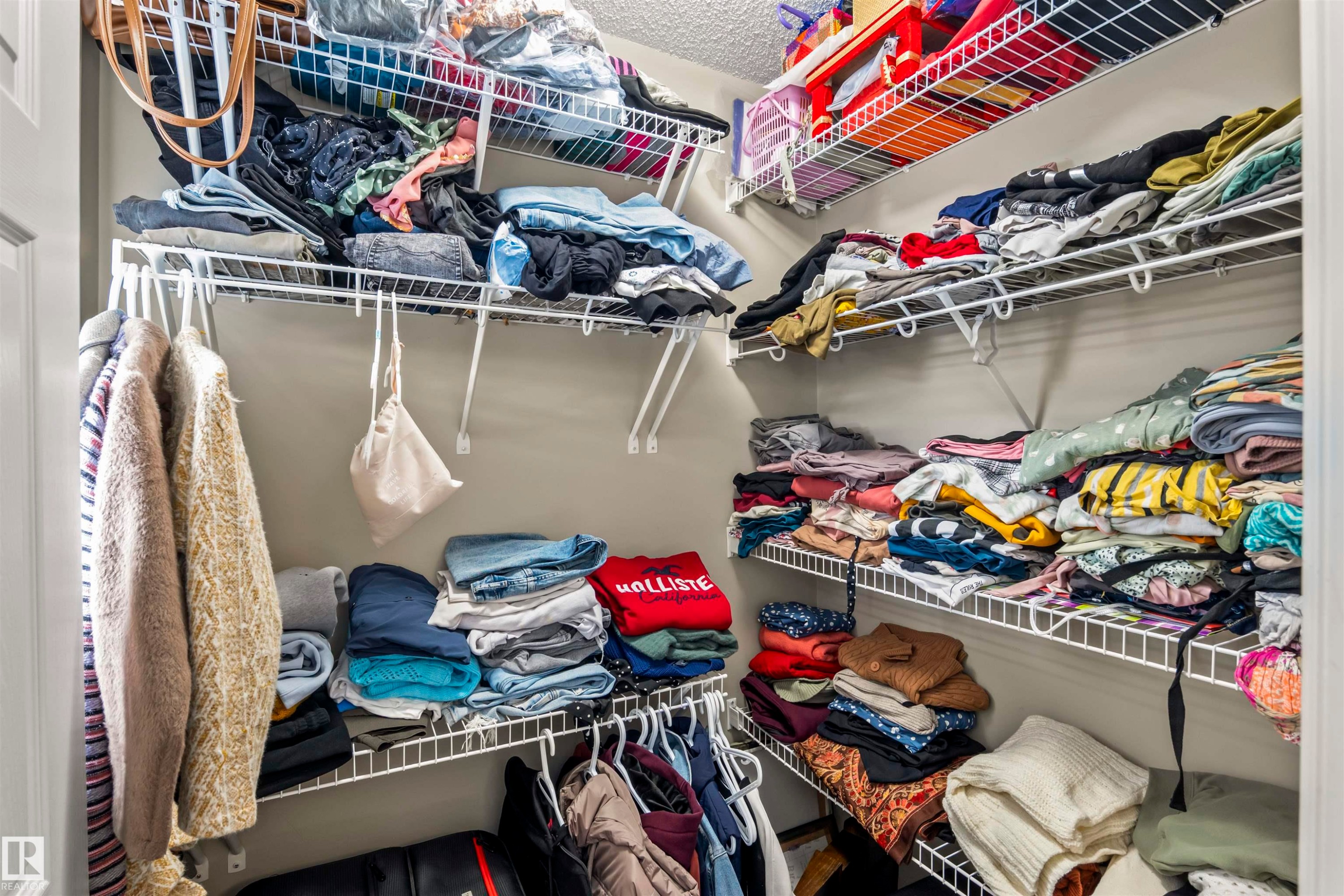 View of spacious closet - 2526 19A Avenue Nw, Edmonton, AB - Indoor With Storage