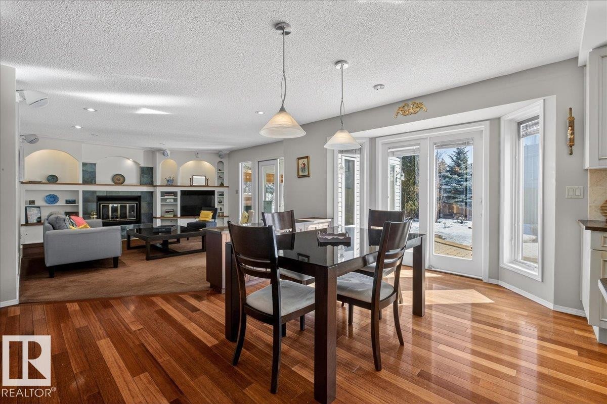 17715 57 Avenue, Edmonton, AB - Indoor Photo Showing Dining Room With Fireplace