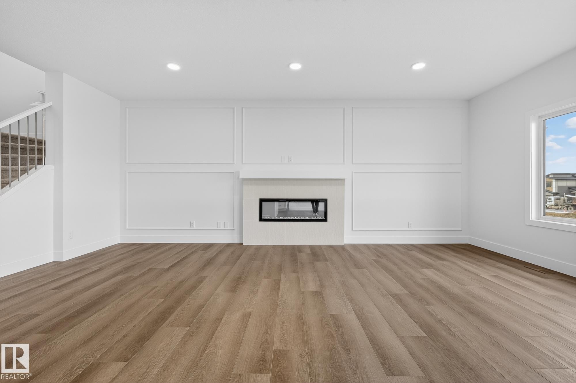 7091 Kiviaq Crescent, Edmonton, AB - Indoor Photo Showing Living Room With Fireplace