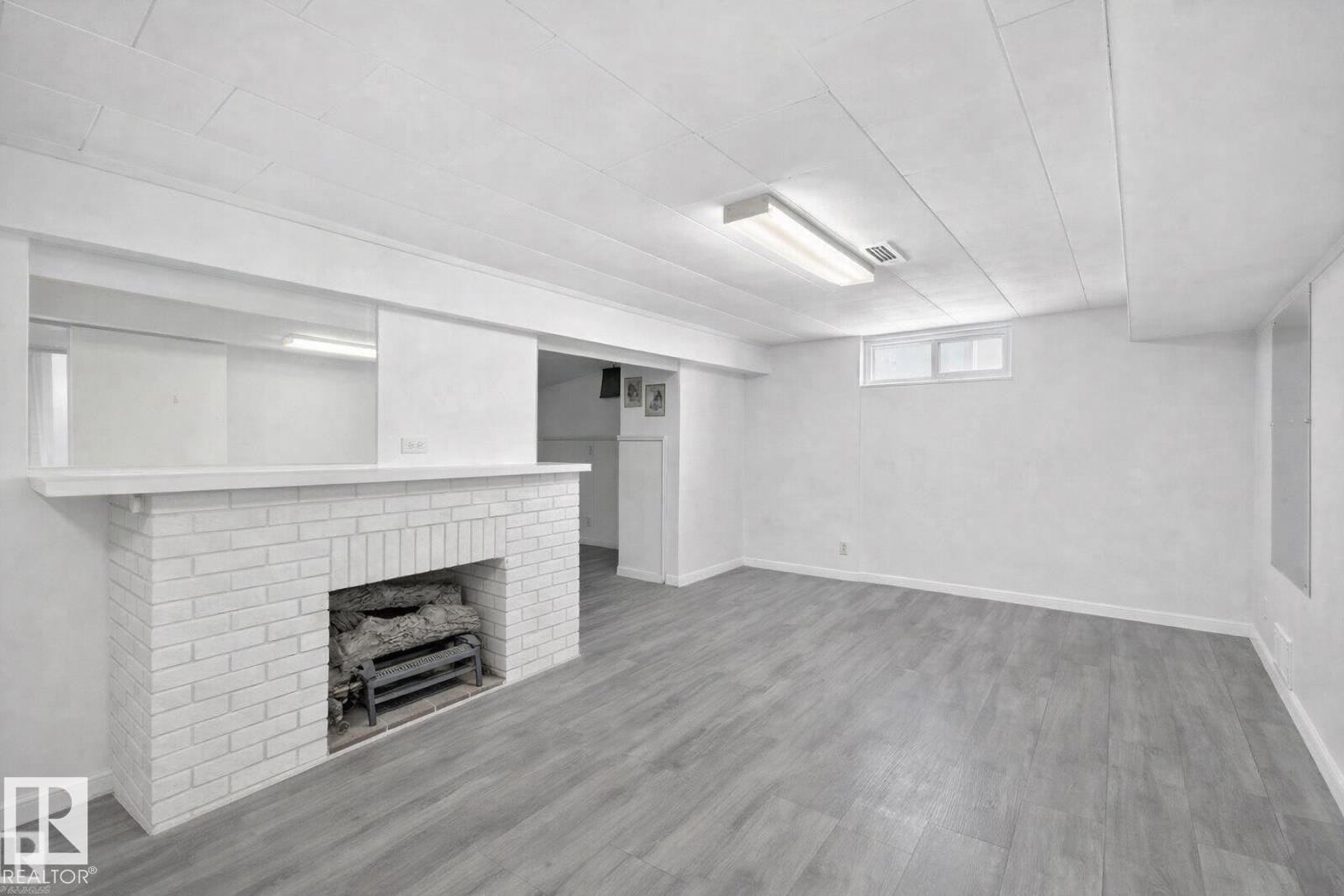 7719 71 Avenue, Edmonton, AB - Indoor With Fireplace