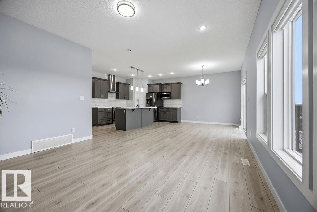 1057 Coopers Hawk Link, Edmonton, AB - Indoor Photo Showing Other Room