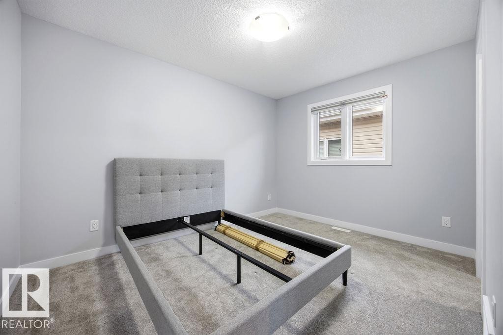 1057 Coopers Hawk Link, Edmonton, AB - Indoor Photo Showing Other Room