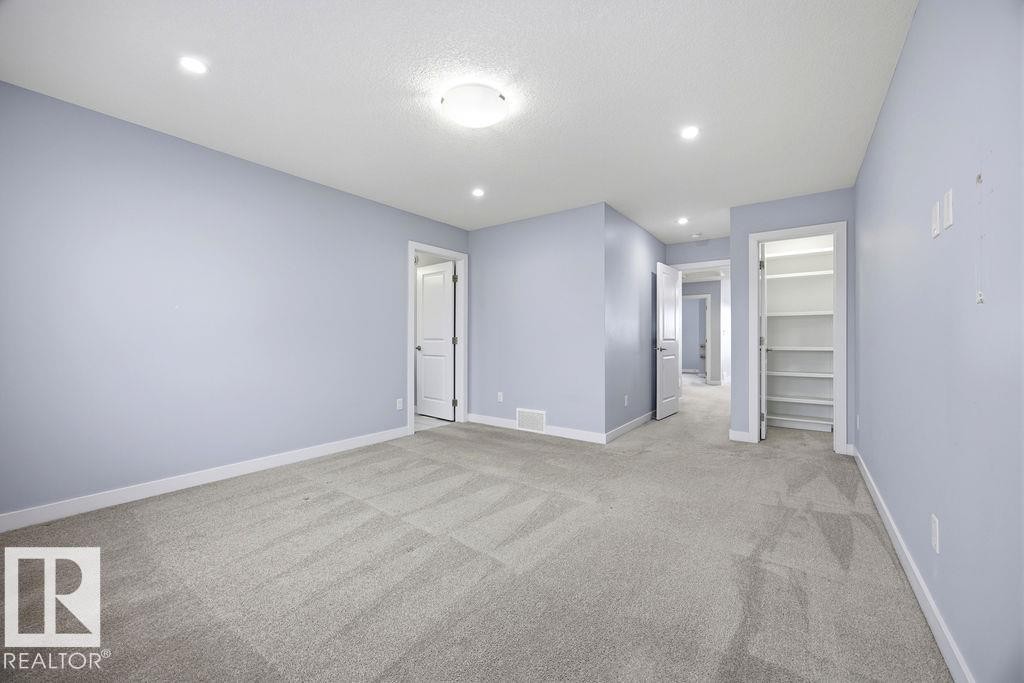 1057 Coopers Hawk Link, Edmonton, AB - Indoor Photo Showing Other Room