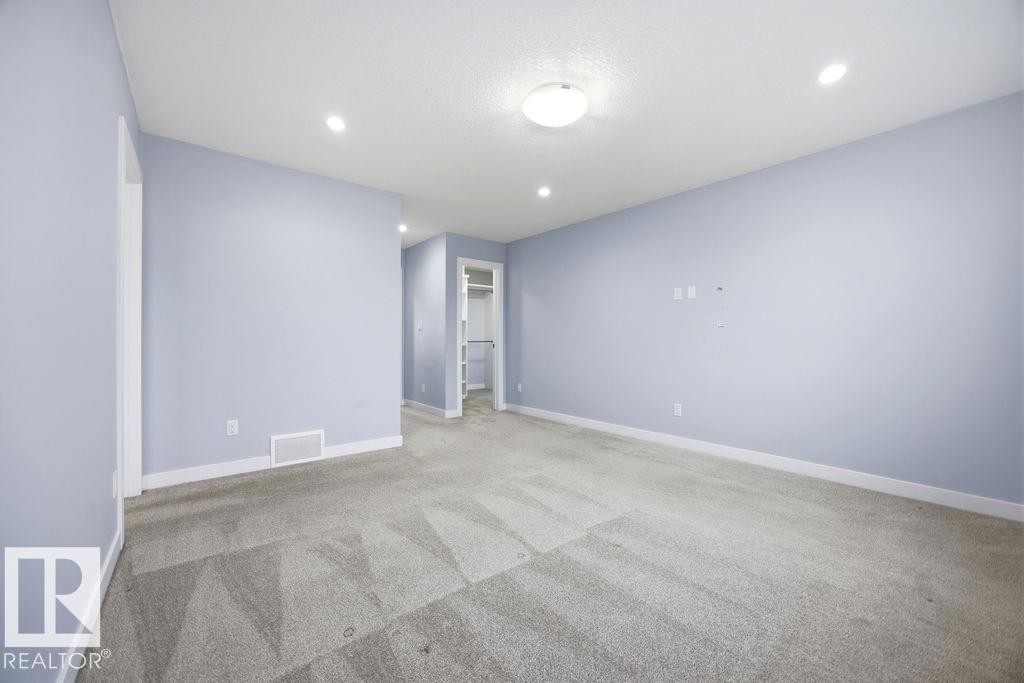 1057 Coopers Hawk Link, Edmonton, AB - Indoor Photo Showing Other Room