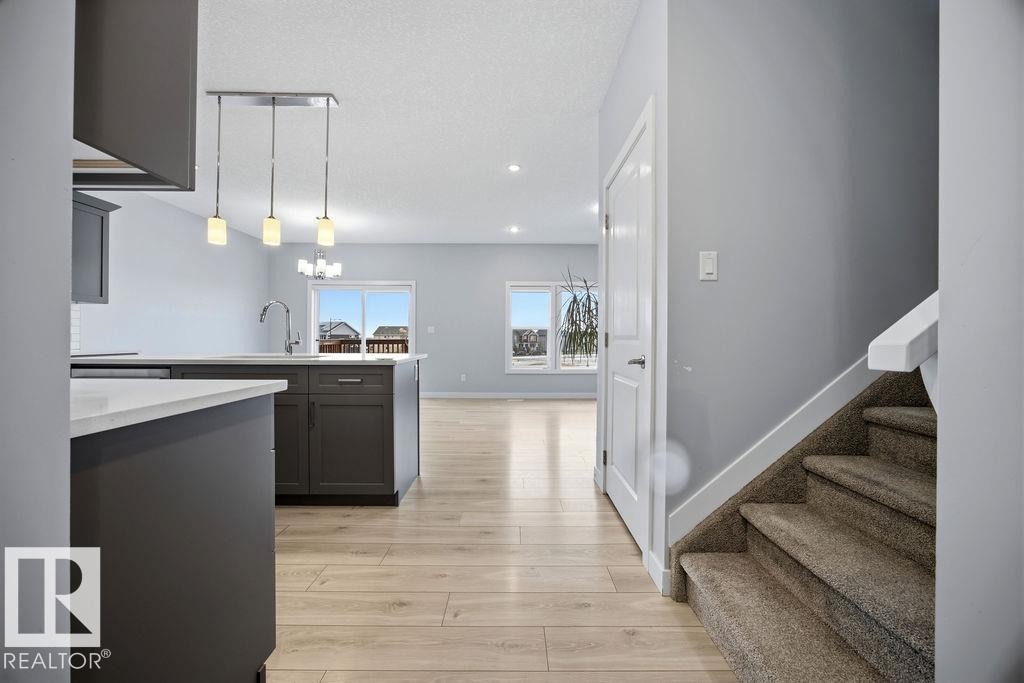 1057 Coopers Hawk Link, Edmonton, AB - Indoor Photo Showing Other Room