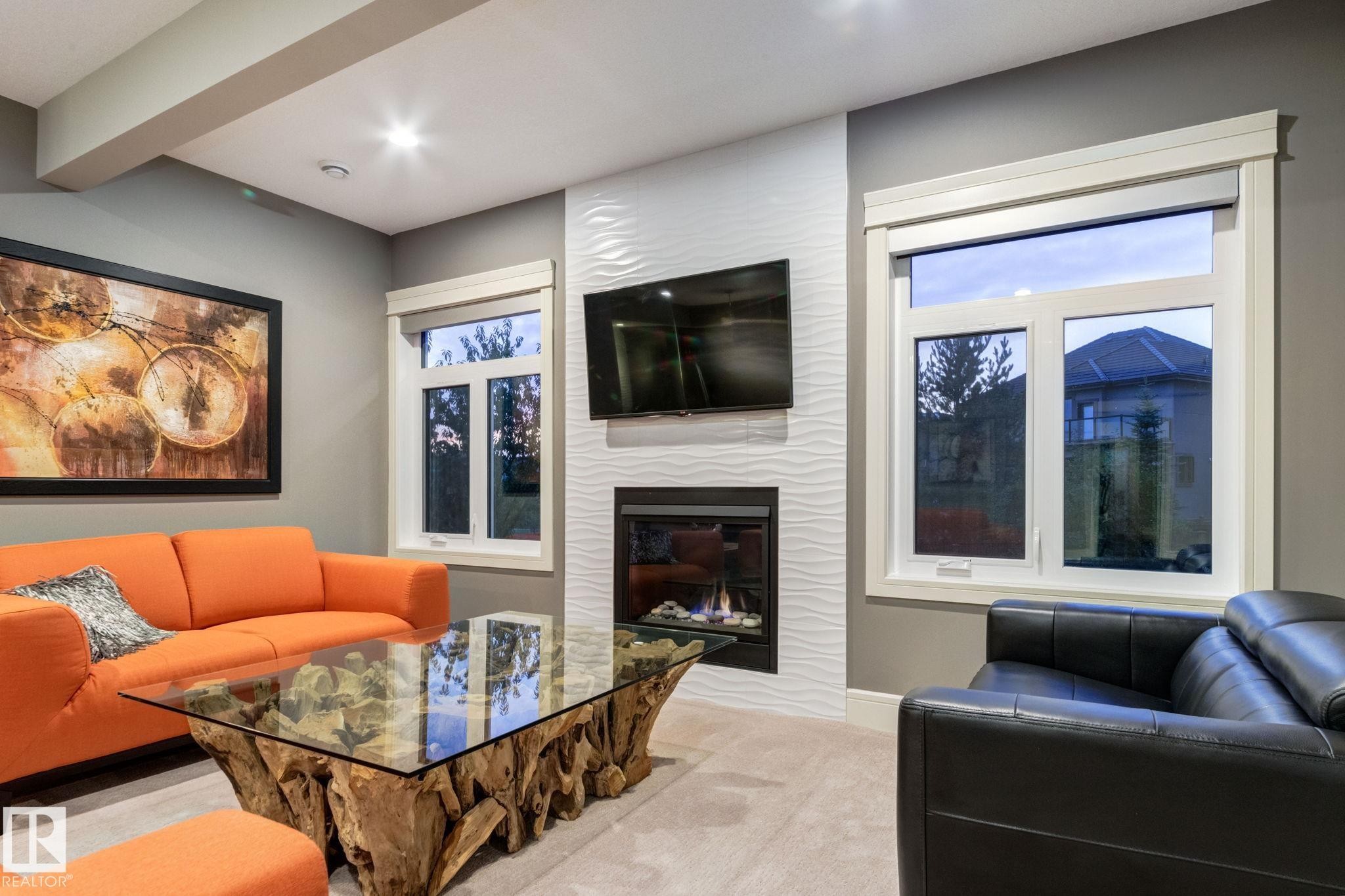 4096 Whispering River Drive Nw, Edmonton, AB - Indoor Photo Showing Living Room With Fireplace