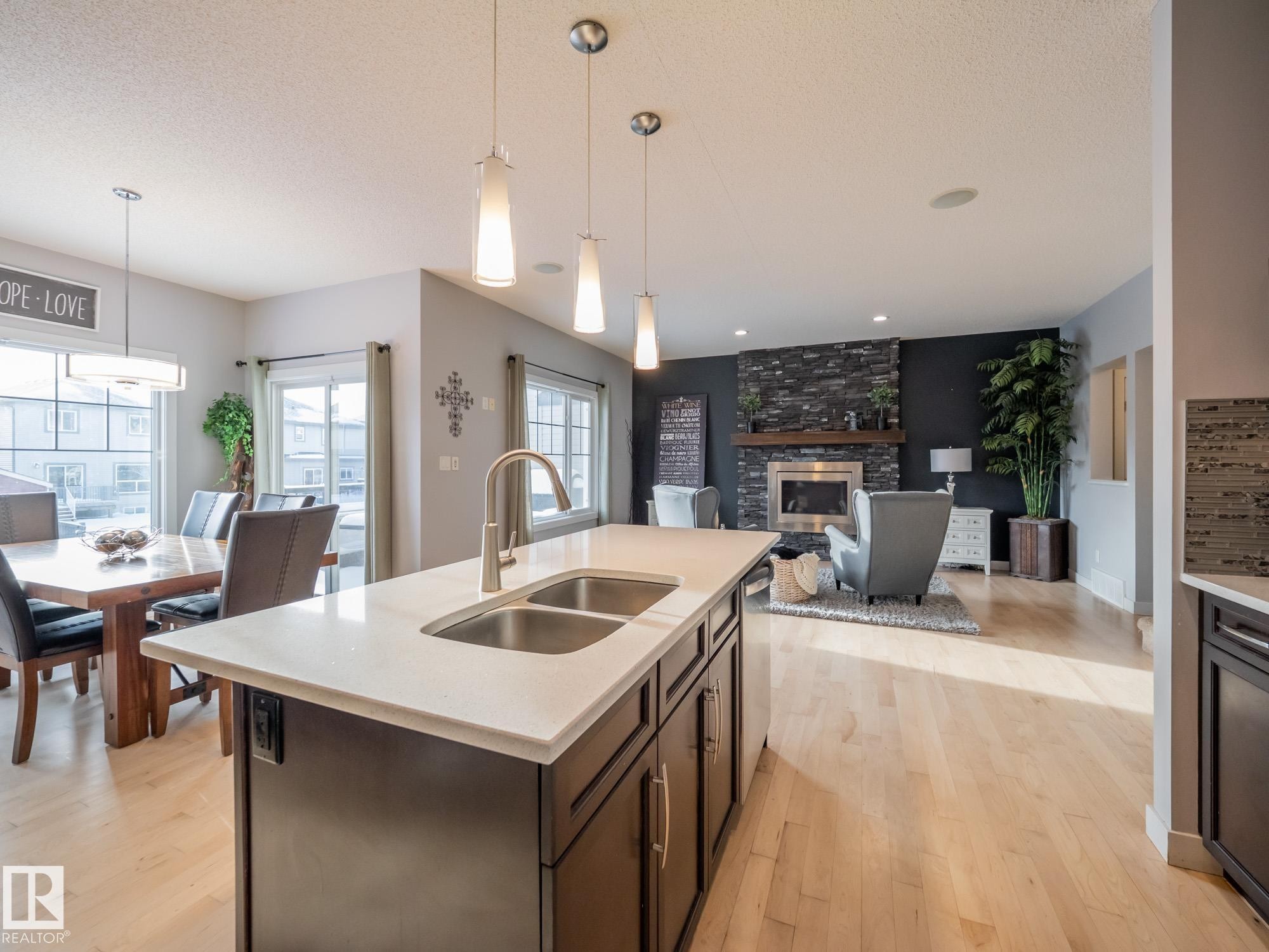 4211 Charles Close, Edmonton, AB - Indoor Photo Showing Kitchen With Fireplace With Double Sink With Upgraded Kitchen