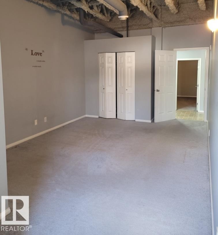 102 9817 103 Street, Fort Saskatchewan, AB - Indoor Photo Showing Other Room