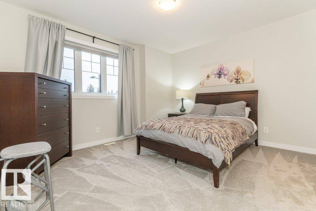 698 Howatt Drive Sw, Edmonton, AB - Indoor Photo Showing Bedroom