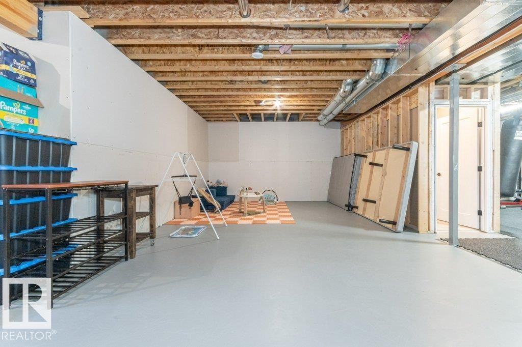 698 Howatt Drive Sw, Edmonton, AB - Indoor Photo Showing Basement