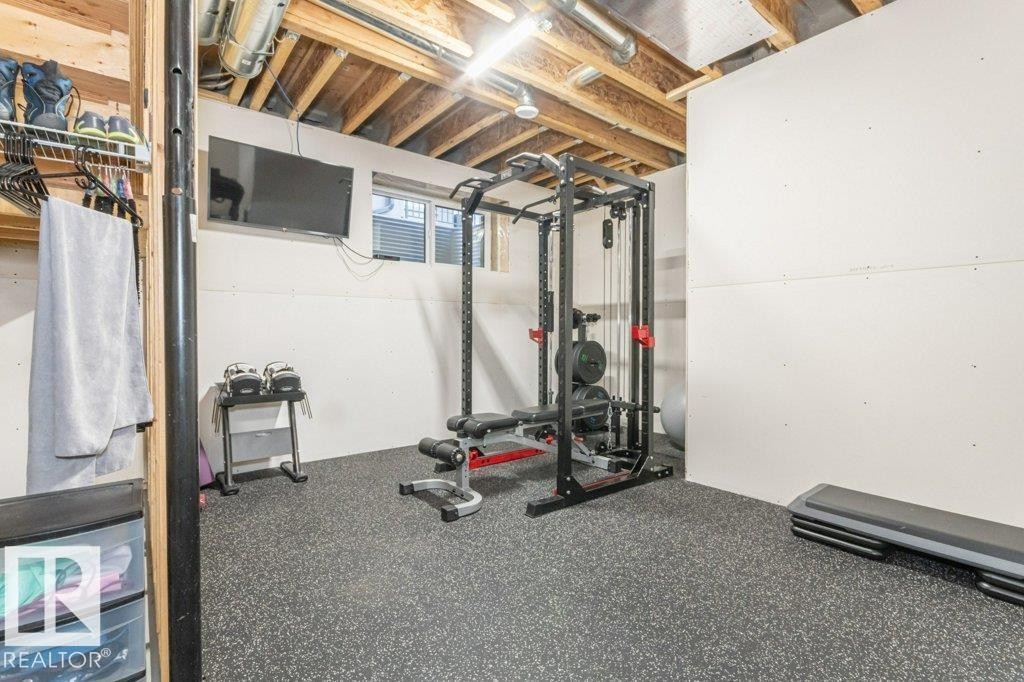 698 Howatt Drive Sw, Edmonton, AB - Indoor Photo Showing Gym Room