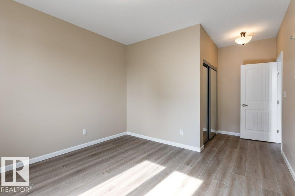206 6083 Maynard Way, Edmonton, AB - Indoor Photo Showing Other Room