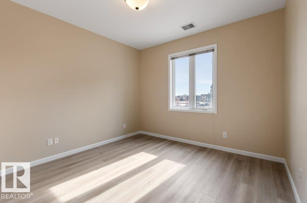 206 6083 Maynard Way, Edmonton, AB - Indoor Photo Showing Other Room